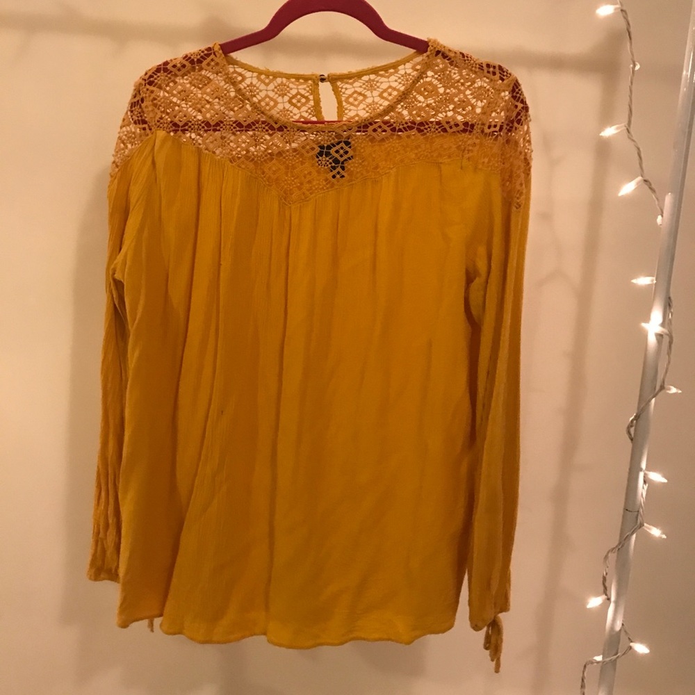 mustard blouse with crochet detail